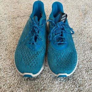Blue adidas Alphabounce shoes